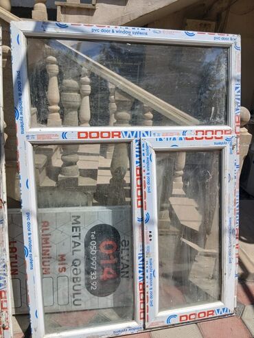 Darvazalar və aksesuarlar: PVC materialdan hazırlanmış bu qapı və pəncərə sistemi həm funksional