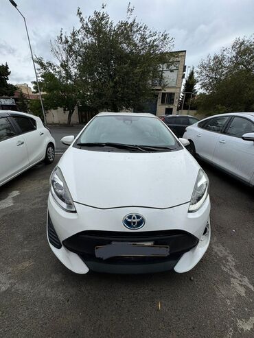 Информатика: Toyota Corolla: 1.2 л | 2018 г. Универсал