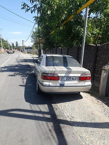 2107 2011: Mazda 626: 1997 г., 2 л, Автомат, Бензин, Седан — 2
