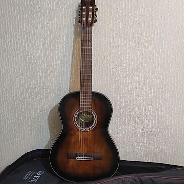korpə cantası: Klassik gitara, Yeni, Ünvandan götürmə — 1