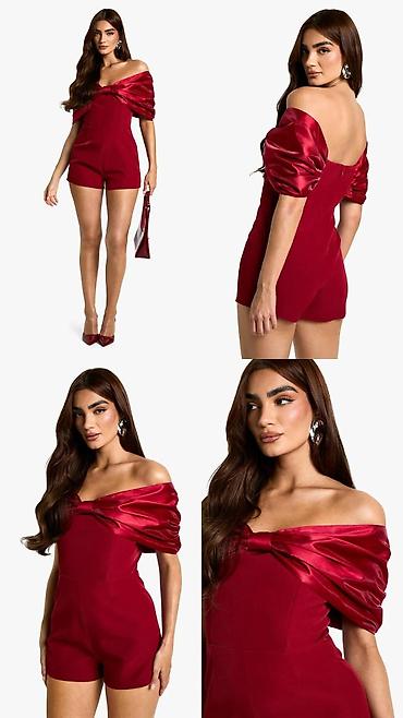 svecani top: Elegantni crveni kratki kombinezon sa spuštenim ramenima i — 1