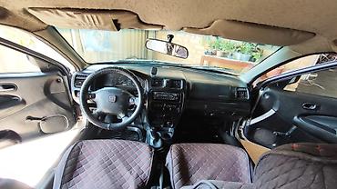 мата секыл: Mazda 323: 1997 г., 1.5 л, Кол менен иштөөчү, Бензин, Седан — 7