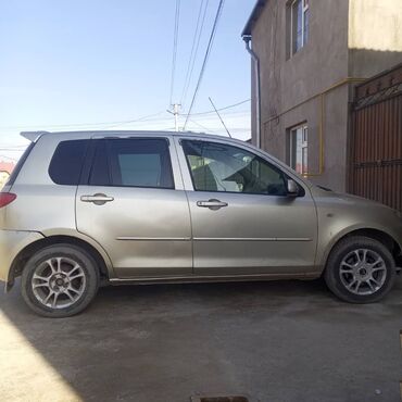 Mazda: Mazda Demio: 2002 г., 1.5 л, Автомат, Бензин