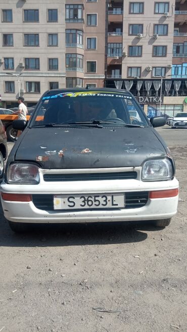 дайхатцу коуре: Daihatsu Cuore: 1992 г., 0.8 л, Механика, Бензин, Купе