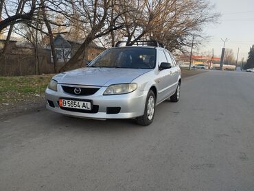 урунган машина: Mazda 323: 2002 г., 1.3 л, Механика, Бензин, Универсал