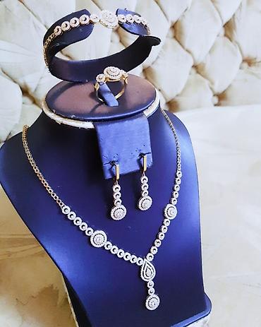 16 sadə: Dəstə daxildir: Kulon, Sep, Sırğa, Swarovski, Sarı qızıl, 585 Əyar, 16400 g — 3
