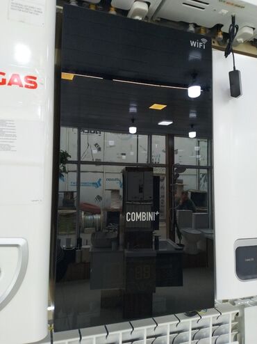 metbex canaq: Məhsul: Kombi qazanı – COMBINI+ (Wi‑Fi ilə) Təsvir: - Şüşə ön panelə
