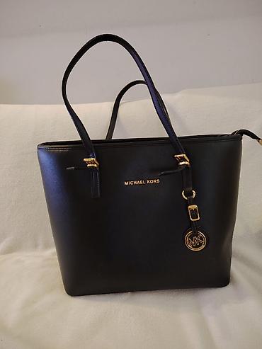 polovan nakit: Elegantna, brendirana torba — 1