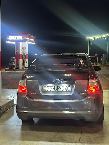 prius salon: Toyota Prius (2-ci nəsil) hibrid hetçbek - Kuzov: hetçbek, tünd boz — 2
