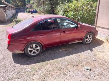 ниссан примера автомат: Красный седан Nissan Primera P12 с аэродинамическим дизайном и