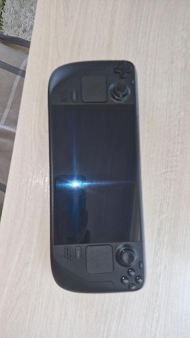 nintendo switch lite сколько стоит: Портативная игровая консоль Valve Steam Deck OLED, 512GB. Практически — 2