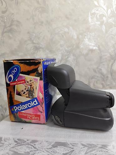 kamera polaroid: Polaroid 600 markalı ani çap edilmiş şəkil çapı üçün foto kamera. 10 — 4