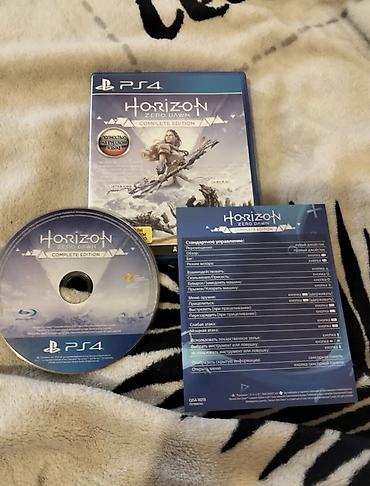 PS4 oyun diski: Horizon Zero Dawn – Complete Edition Məzmun: -