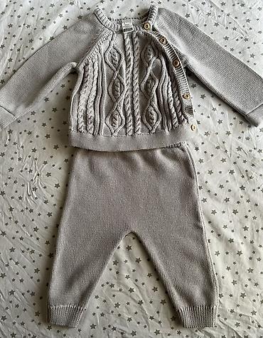 Вязаный комплект для малыша LC Waikiki Baby: кофта и штанишки