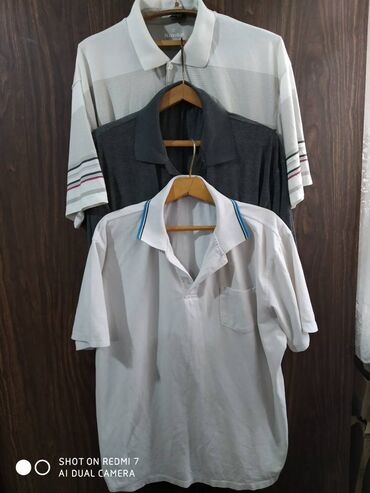 Рубашки: Мужская одежда б/у: рубашки, футболки, безрукавка, олимпийки. от — 7