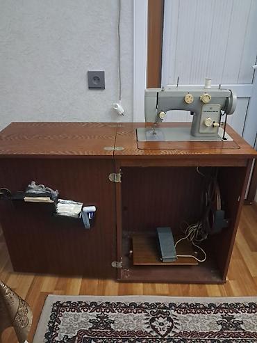 Tikiş maşınları: Tikiş maşını İşlənmiş,Elektromexaniki, 3 saplı, Ünvandan götürmə — 1