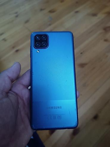 Мобильные телефоны и аксессуары: Samsung Galaxy A12, 64 ГБ, цвет - Голубой, Две SIM карты — 2