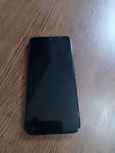 manqal kamin: Xiaomi Redmi 7, 64 ГБ, цвет - Черный, 
 Кнопочный, Сенсорный, Отпечаток пальца