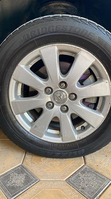 rd 1: Оригинальные колёсные диски Toyota с зимними шинами Bridgestone — 4