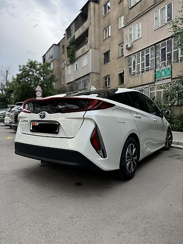 byd e2 2025: Toyota Prius: 2019 г., 1.8 л, Робот, Гибрид, Лифтбек — 4