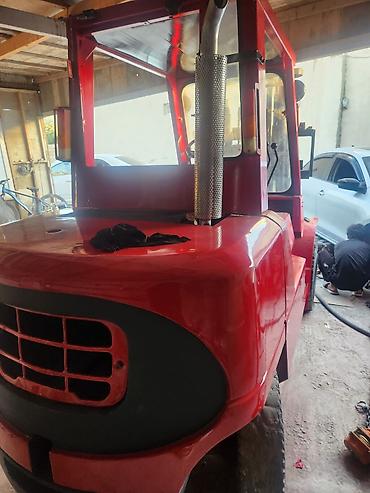 forklift operatoru: Qaldırıcı forklift – dizel, tammetal konstruksiya, qapalı operator — 2