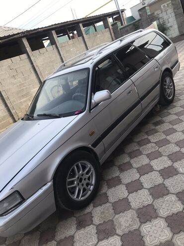 сумка для авто: Mazda 626: 1990 г., 2 л, Механика, Бензин, Универсал