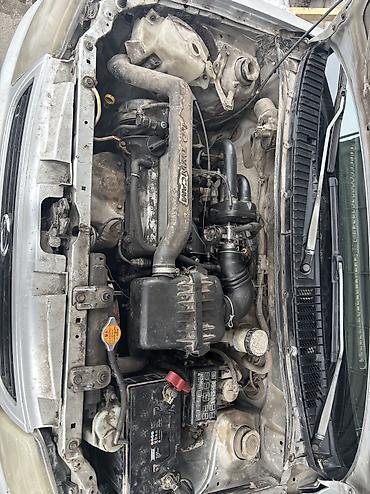 Daihatsu: Daihatsu Cuore: 2002 г., 1 л, Механика, Бензин — 19