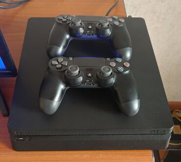 сколька стоит плейстейшен 4: Продаю PS4 закаченны 10 игр Slim 500gb вторая ревизия. (2216а)