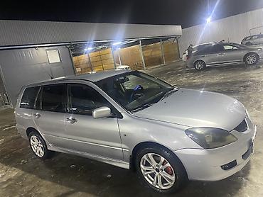 митсубиси спейс стар: Mitsubishi Lancer: 2003 г., 2 л, Механика, Бензин, Универсал — 1