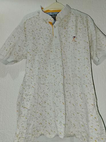 Majice: Muške polo majice – 2 komada Svaka majca po 600dinara 1) Infinity Man — 15