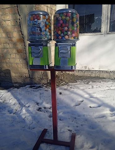 тынчтык ж м: Двухсекционный торговый автомат на стойке для продажи жевательных — 1