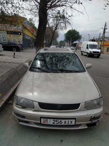 Mazda: Mazda 323: 1995 г., 1.5 л, Механика, Бензин, Седан