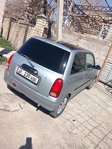 трёхдверный: Daihatsu Cuore: 2002 г., 1 л, Автомат, Бензин, Хэтчбэк — 5