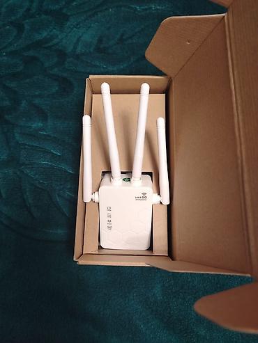 kabelsiz modem: Dual-Band Wi‑Fi Gücləndirici / Repeater Xüsusiyyətlər: - 2.4 GHz və 5 — 2