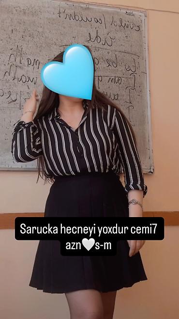 Qara rəngli qısa ətək - Klassik qara rəng, pliseli kəsim - Dizdən lalafo.az -da Qara rəngli qısa ətək - Klassik qara rəng, pliseli kəsim - Dizdən