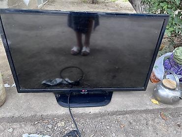 black sharp: Телевизор LG, диагональ около 32" (визуально). Особенности: - — 1