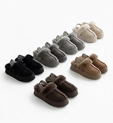 UGG ženske papuče/clogs sa krznenom postavom i remenom preko pete. -