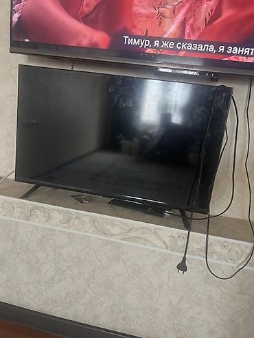 тв тюнер для телевизора: Телевизор LED, диагональ ориентировочно 32–40". Черный корпус, тонкие — 2