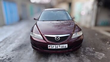 Mazda: В отличном состоянии. Чёрный кожаный салон. С подогревами сидений