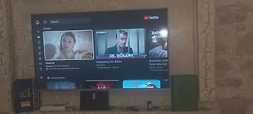 Телевизоры: Smart TV – TAUBE interfeysi ilə - Ekran: Təxminən 55–60 düym — 4
