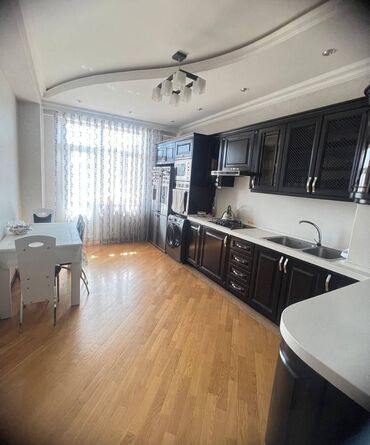 Uzunmüddətli kirayə mənzillər: 9-mikrorayonda Tərlan Şadlıq sarayının yanında 20 mərtəbəli binanın — 9