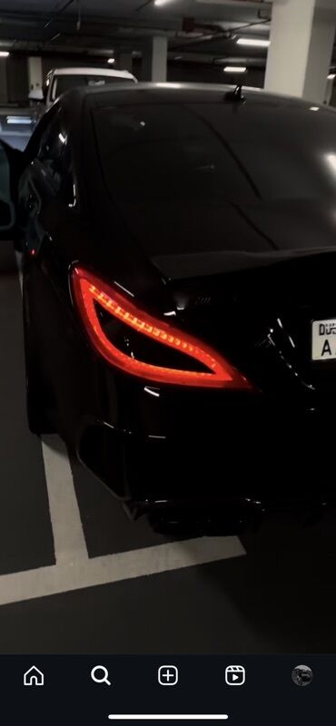 ежемалина купить: Черный Mercedes-Benz CLS с элегантными светодиодными задними фонарями