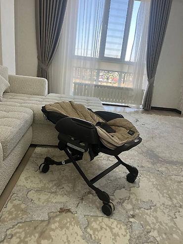 4 mom: Японская компания Combi разработала уникальную электронную люльку- — 4