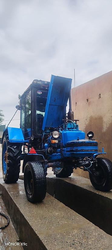 Kommersiya nəqliyyat vasitələri: Kənd təsərrüfatı üçün universal təkərli traktor Xüsusiyyətlər: - — 5