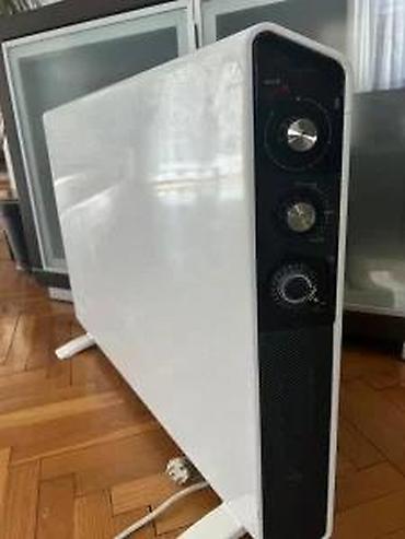 Kaloriferi: Delonghi Slim Style HCX3220FTS – električni konvektor - Snaga: 2000 W — 24