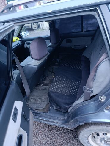 Mazda: Mazda 323: 1990 г., 1.6 л, Механика, Бензин, Универсал — 5