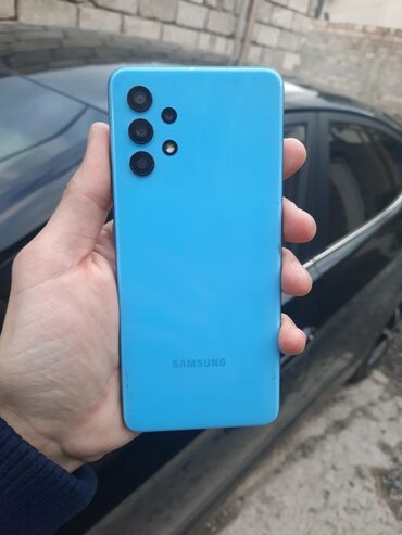 Мобильные телефоны и аксессуары: Samsung Galaxy A32, 64 ГБ, цвет - Голубой, Сенсорный, Отпечаток пальца, Face ID