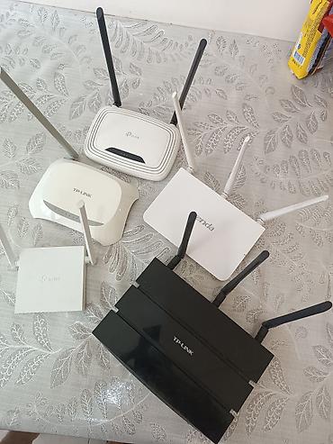 Wi‑Fi routerlər toplusu Brendlər: TP‑Link və Tenda. Korpusda müxtəlif