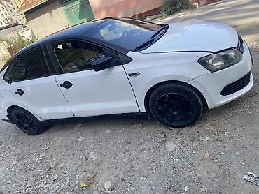 Транспорт: Volkswagen Polo: 2014 г., 1.6 л, Механика, Газ, Седан — 2