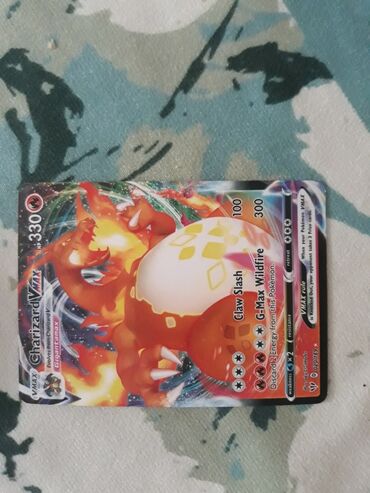 1000 manat: V max chaizard yaxsi veziyyetdedir guclu kartdir pokeman kartidir